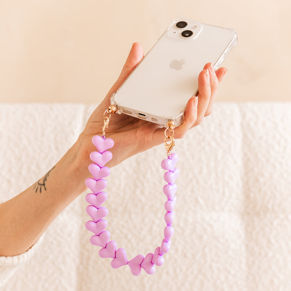 Phone case with purple hearts cord