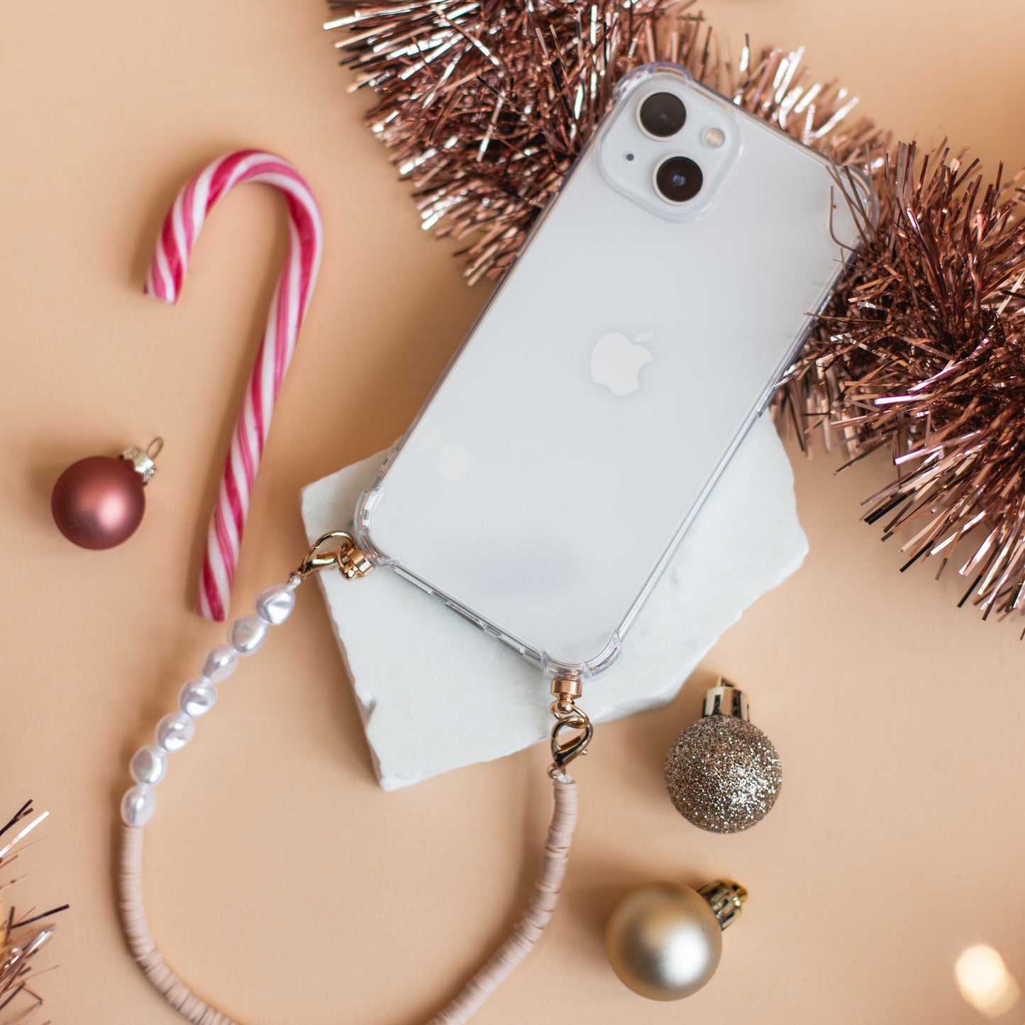 Phone case with nude &amp; pearl cord