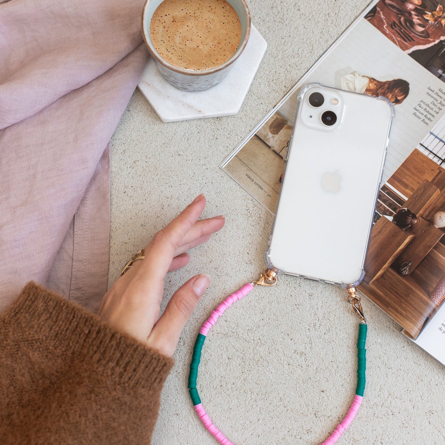 Phone case with pink & green swirl cord