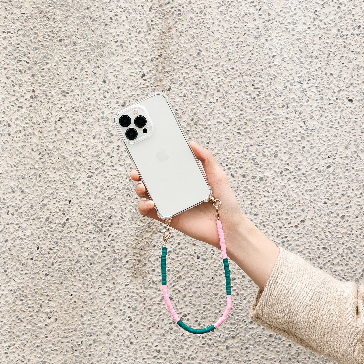 Phone case with pink & green swirl cord