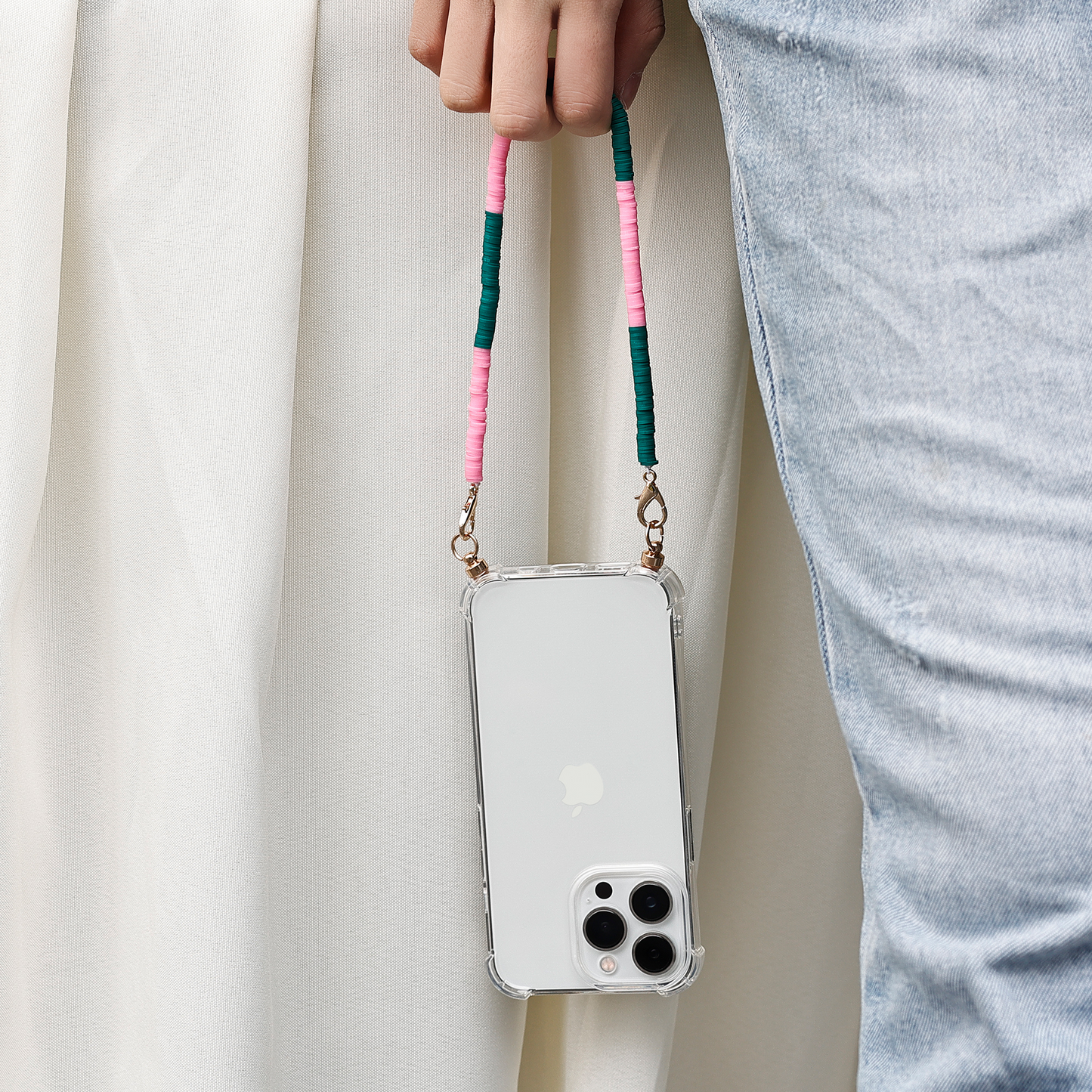 Phone case with pink & green swirl cord